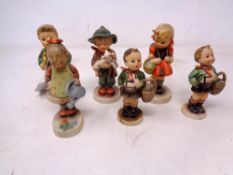A group of six Goebel figures of children