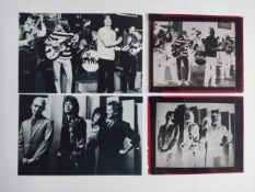 Vintage negatives of the Rolling Stones on stage in the 1960's and a promo shot in the 1990's.