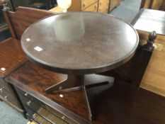 A 20th century circular Bakelite pedestal occasional table