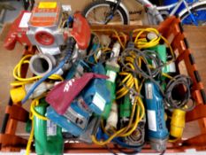 A crate of assorted power tools including Makita, Bosch,