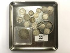 A Victorian 1893 half crown together with further coins including three pence pieces,
