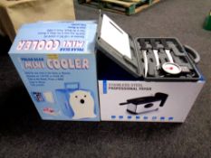 A cased knife set together with a Polar Bear mini cooler,