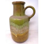 A glazed stoneware flagon