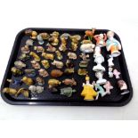A tray of Wade whimsies and china dolly tops