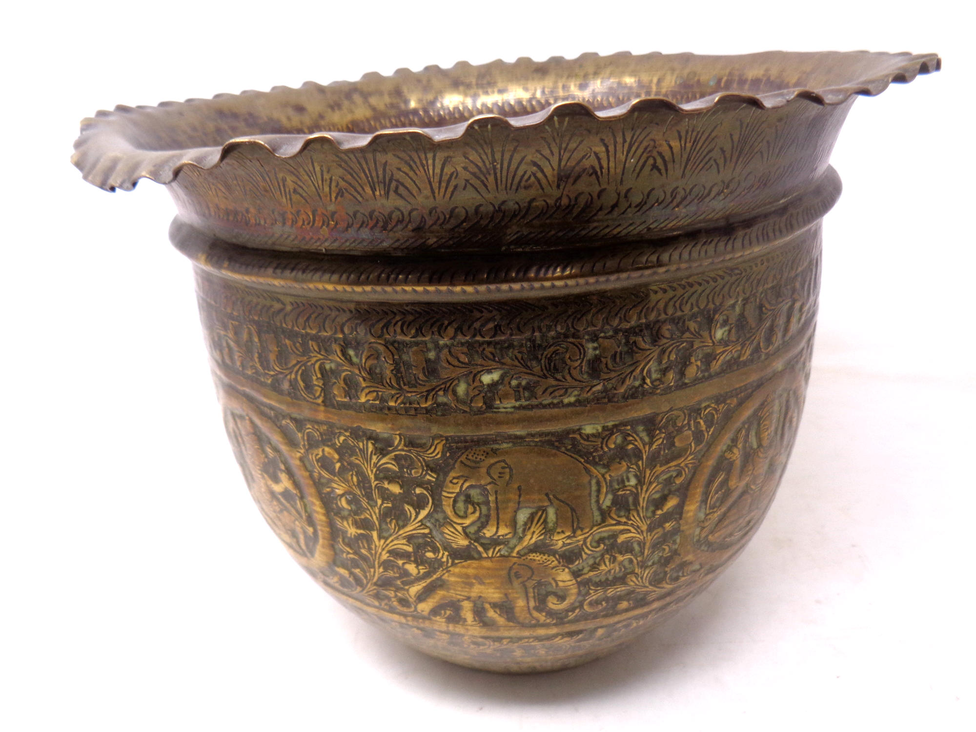 A 19th century Indian embossed brass planter