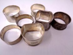 Seven various hallmarked silver napkin rings