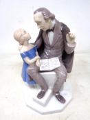 A Bing and Grondhal figure of a teacher with girl