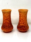 A pair of Pilkingtons Royal Lancastrian vases decorated in orange mottled glaze,