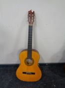 An Encore acoustic guitar