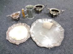 A silver plated scallop edged tray on claw and ball feet together with a tankard with a bone handle