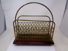 An early 20th century brass and mahogany letter rack