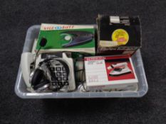 A box of various electricals, headphones, telephone, Philips infrared heater,