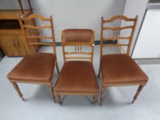 Three Victorian salon chairs.