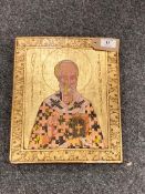 Twentieth Century Russian School : A Bearded Figure in Gowns Holding a Bible, an icon on wood,