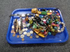 A tray of costume jewellery, coins,