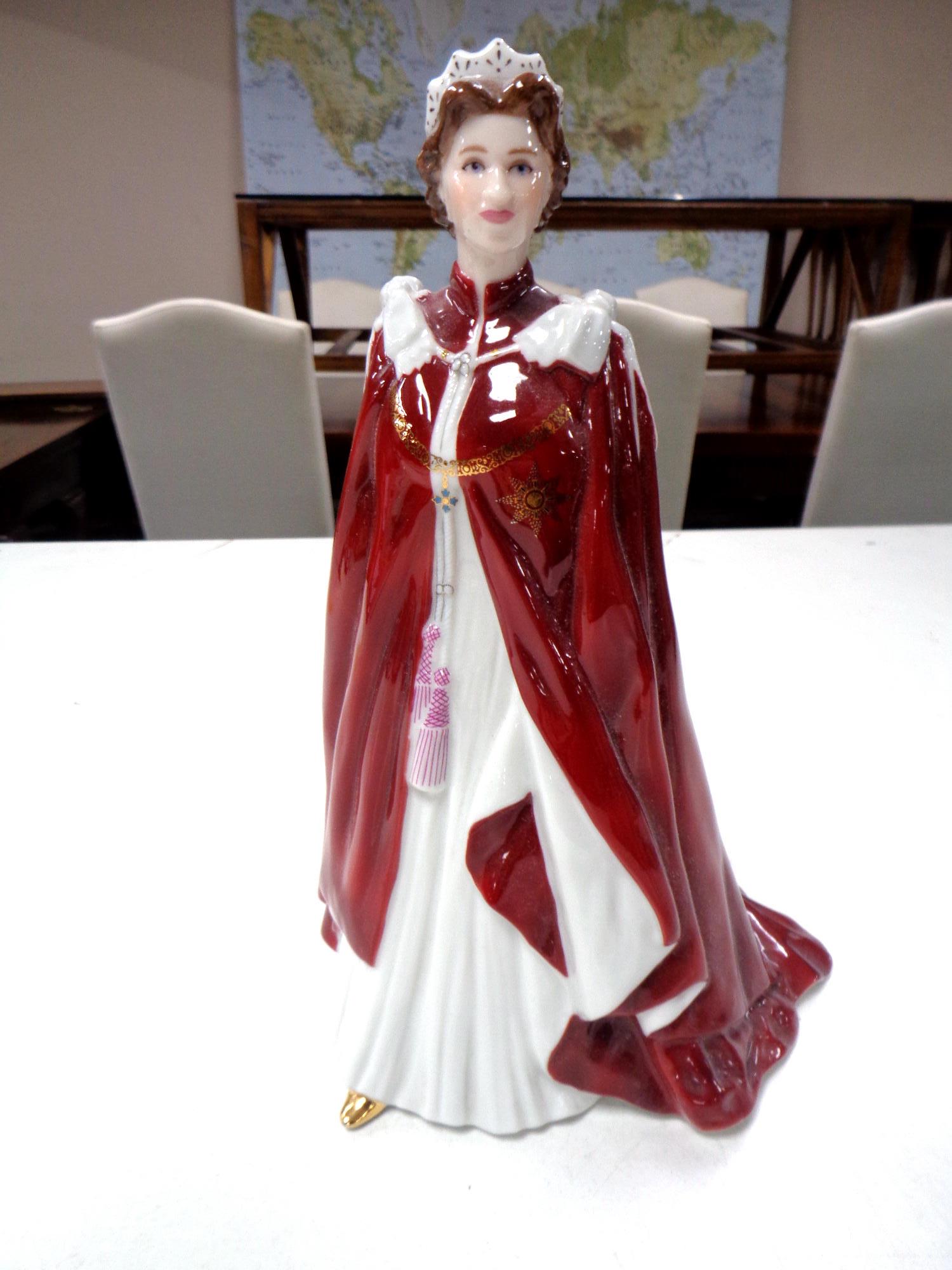 A Royal Worcester figure in celebration of the Queen's 80th birthday 2006.