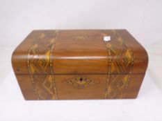 An inlaid Victorian sewing box.