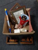 A box containing locomotive wooden book ends, a golly teddy bear, pictures, prints etc.