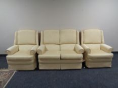 A three-piece Parker Knoll lounge suite comprising of two seater settee and pair of armchairs.