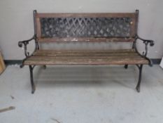 A wood and metal garden bench.