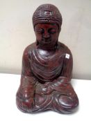A heavily cast plaster figure of Buddha