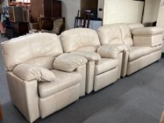 A G-Plan cream leather three seater settee with pair of chairs and foot stool.