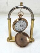 A old Hunter pocket watch on stand