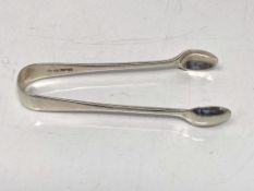 A pair of Victorian silver sugar tongs