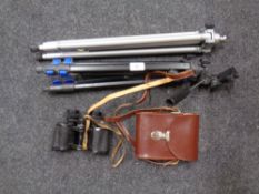 Two camera tripods together with a pair of Carl Zeiss 8 x 30 binoculars.