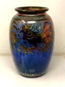 A Pilkingtons Royal Lancastrian vase, blue ground with lustre decoration of cockerels, height 29.