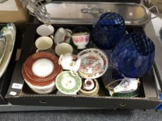 A box containing a quantity of part tea china sets, plates, cups, pair of blue glass goblets.