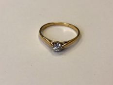 A yellow gold diamond solitaire ring, marks rubbed, size U CONDITION REPORT: 2.