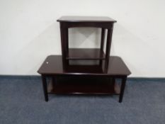 A mahogany coffee table together with matching lamp table.