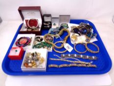 A tray of costume jewellery, watches,