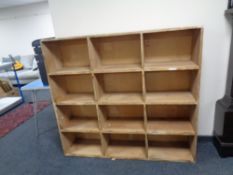 A pine storage pigeon hole bookcase.