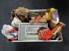 A box of vintage toys to include an action man, stylophone in box, view master etc.