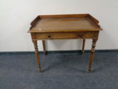 A Victorian mahogany side table fitted a drawer.