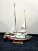 A wooden pond yacht.