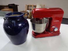 A Klarstein food mixer together with a blue glazed vase.