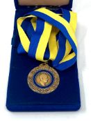 A Rotary Foundational medallion on ribbon