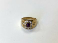 An 18ct gold diamond and cabochon ruby ring, size O CONDITION REPORT: 6.