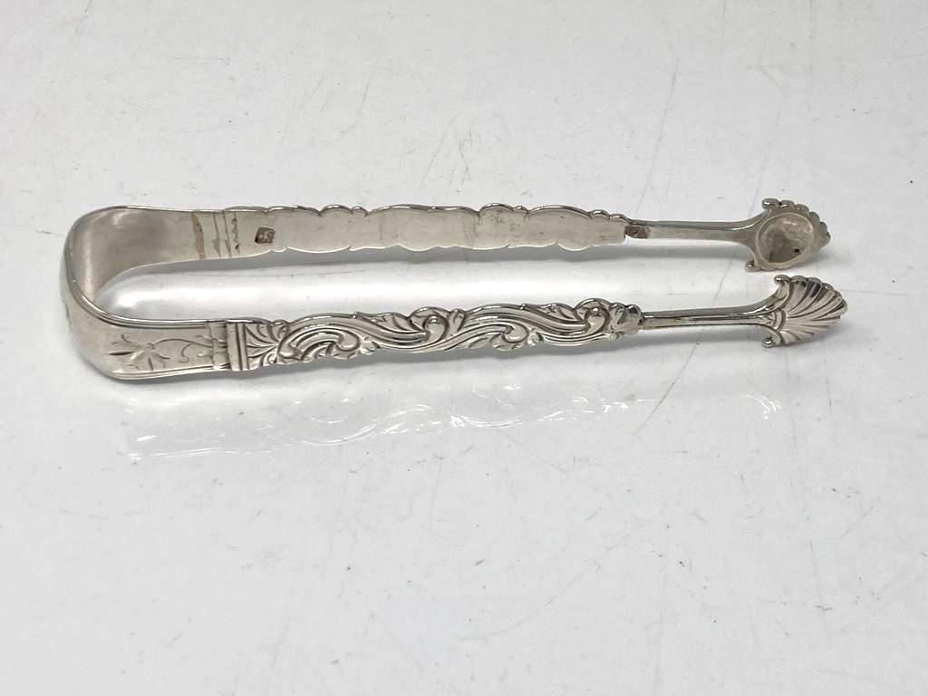 A pair of silver fancy sugar tongs