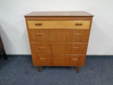 A 20th century four drawer chest.