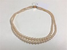 A double strand of Ciro cultured pearls on 9ct clasp