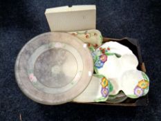 A box of ceramic plates, serving plates, a glass frosted comport.