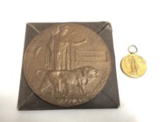 A First World War Victory Medal and death plaque in envelope of issue,