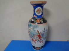 A modern Chinese vase decorated with warriors.