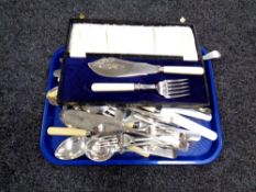 Tray of silver plated cutlery, cased servers, a silver condiment pot.