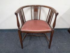 An Edwardian inlaid corner chair.