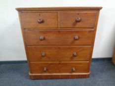 A Victorian satinwood five drawer chest